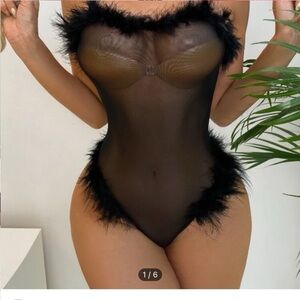 Size medium sheer  with feather lingerie one piece
